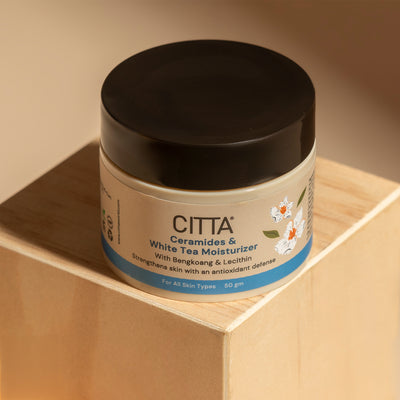 50gm $$** CITTA Ceramides & White Tea Moisturizer jar on a wooden shelf