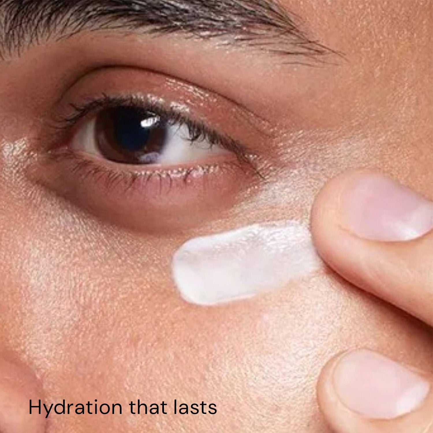 Woman applying hydrating under eye cream for smooth and comfortable skin