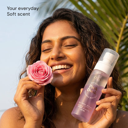  woman holding citta pink dusk skin scent body mist for an everyday soft scent