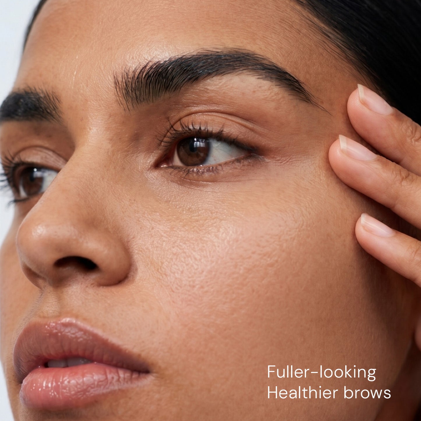 Woman with fuller-looking brows after using CITTA eyebrow growth serum