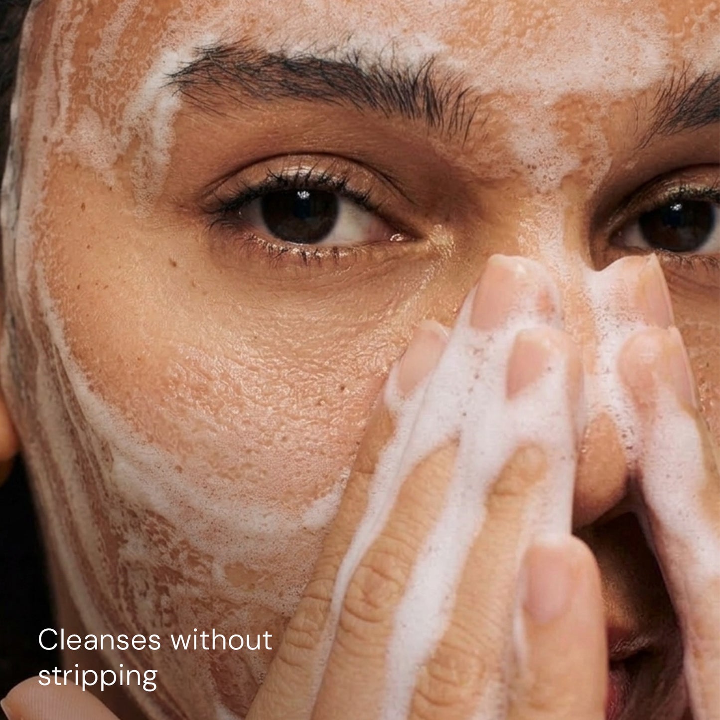 Woman using CITTA foaming face wash for gentle cleansing without drying skin